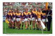 1 September 1996; The Wexford team, lead by captain Martin Storey, during the pre-match parade. Wexford v Limerick, All Ireland Hurling Final, Croke Park, Dublin. Picture credit; Ray McManus / SPORTSFILE