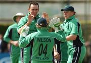 10 May 2007; Trent Johnston, Ireland, is congratulated by Gary Wilson, no. 04, and Kevin O'Brien after his second wicket against Gloucestershire. ECB Friends Provident One Day Trophy, Ireland v Gloucestershire, Castle Avenue, Clontarf, Dublin. Picture credit: Matt Browne / SPORTSFILE