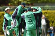 10 May 2007; Irish players celebrate Trent Johnston's hat-trick against Gloucestershire. ECB Friends Provident One Day Trophy, Ireland v Gloucestershire, Castle Avenue, Clontarf, Dublin. Picture credit: Matt Browne / SPORTSFILE