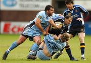 11 May 2007; Felipe Contepomi, Leinster, is tackled by Jamie Robinson,13, and Gary Powell, Cardiff Blues. Magners League, Cardiff Blues v Leinster, Arms Park, Cardiff, Wales. Picture credit: Matt Browne / SPORTSFILE