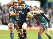 11 May 2007; Gordon D'Arcy, Leinster, is tackled by Robert Sidoli, left, and Gareth Williams, Cardiff Blues. Magners League, Cardiff Blues v Leinster, Arms Park, Cardiff, Wales. Picture credit: Matt Browne / SPORTSFILE