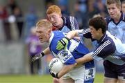 12 May 2007; Eamon O Ceallaigh, Laois, in action against Sean Casserly and Rory O'Carroll, Dublin. Minor Football Championship Quater final, Dublin v Laois, Parnell Park, Dublin. Picture credit: Ray Lohan / SPORTSFILE *** Local Caption ***