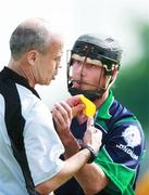 13 May 2007; London's Brian Forde tries to stop referee Tiernach Mahon from giving him a yellow card. Guinness Ulster Senior Hurling Championship, Antrim v London, Casement Park, Belfast, Co. Antrim. Picture credit: Russell Pritchard / SPORTSFILE