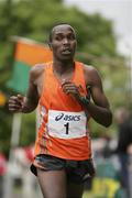 13 May 2007; Last years winner Simon Tanoui, Kenya, crosses the line to take second place in the Woodies DIY Sportsworld Dublin 5 Mile Classic Road Race. Walkinstown, Dublin. Picture credit: Tomas Greally / SPORTSFILE