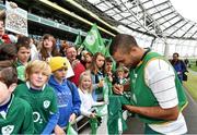 31 October 2014; Ireland's Simon Zebo signs autographs for supporters after the open training session ahead of their Guinness Series Autumn Internationals against South Africa, Georgia and Australia. Ireland Rugby Open Training Session, Aviva Stadium, Lansdowne Road, Dublin. Picture credit: Matt Browne / SPORTSFILE