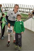 31 October 2014; Ireland's Devin Toner with 9 year old Scott Browne from Hacketstown, Co. Carlow after the open training session ahead of their Guinness Series Autumn Internationals against South Africa, Georgia and Australia. Ireland Rugby Open Training Session, Aviva Stadium, Lansdowne Road, Dublin. Picture credit: Matt Browne / SPORTSFILE