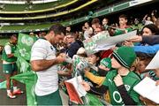31 October 2014; Ireland's Rob Kearney signs autographs for supporters after the open training session ahead of their Guinness Series Autumn Internationals against South Africa, Georgia and Australia. Ireland Rugby Open Training Session, Aviva Stadium, Lansdowne Road, Dublin. Picture credit: Matt Browne / SPORTSFILE