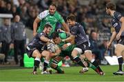 31 October 2014; Quinn Roux, Connacht, is tackled by Martin Roberts and Tom Grabham, Ospreys. Guinness PRO12, Round 7, Ospreys v Connacht, Liberty Stadium, Swansea, Wales. Picture credit: Steve Pope / SPORTSFILE
