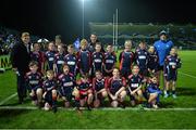 31 October 2014; The Coolmine RFC half-time minis team with Leinster's Ian Madigan, left, and Jamie Heaslip, right, during the Guinness PRO12, Round 7, match between Leinster and Edinburgh at the RDS, Ballsbridge, Dublin. Picture credit: Stephen McCarthy / SPORTSFILE