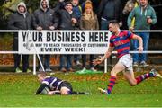 1 November 2014; Stephen O'Neill, Terenure, crosses the line to score the opening try of the game after breaking away from Matt Darcy, Clontarf. Ulster Bank League, Division 1A, Terenure v Clontarf, Lakelands Park, Terenure, Dublin. Picture credit: Barry Cregg / SPORTSFILE
