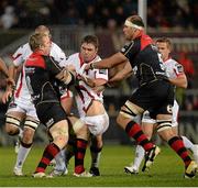 1 November 2014; Roger Wilson, supported by Wiehahn Herbst, Ulster, is tackled by Andy Powell, left, and Rynard Landman, Newport Gwent Dragons. Guinness PRO12, Round 7, Ulster v Newport Gwent Dragons, Kingspan Stadium, Ravenhill Park, Belfast, Co. Antrim. Picture credit: Oliver McVeigh / SPORTSFILE