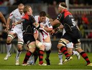 1 November 2014; Roger Wilson, supported by Wiehahn Herbst, Ulster, is tackled by Andy Powell, left, and Rynard Landman, Newport Gwent Dragons. Guinness PRO12, Round 7, Ulster v Newport Gwent Dragons, Kingspan Stadium, Ravenhill Park, Belfast, Co. Antrim. Picture credit: Oliver McVeigh / SPORTSFILE