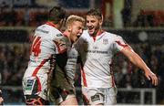 1 November 2014; Stuart Olding, Ulster, celebrates scoring his side's first try of the game with teammates Louis Ludik, left, and Stuart McCloskey. Guinness PRO12, Round 7, Ulster v Newport Gwent Dragons, Kingspan Stadium, Ravenhill Park, Belfast, Co. Antrim. Picture credit: Oliver McVeigh / SPORTSFILE