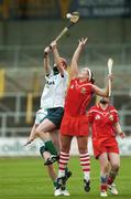 6 May 2007; Niamh Mulcahy, Limerick, in action against Regina Curtin, Cork. Camogie National League Division 1B Final, Cork v Limerick, Nowlan Park, Co. Kilkenny. Picture credit: Matt Browne / SPORTSFILE