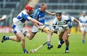 29 April 2007; Dony Hyland, Wicklow, in action against Matthew Whelan, left, and Darren Rooney, Laois. Allianz National Hurling League, Division 2 Final, Wicklow v Laois, Semple Stadium, Thurles, Co. Tipperary. Picture credit: Brendan Moran / SPORTSFILE