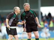 13 May 2007; Linesman Marty Duffy in conversation with referee Pat McEnaney during the game. Bank of Ireland Leinster Senior Football Championship, Longford v Westmeath, Pearse Park, Longford. Picture credit: Ray McManus / SPORTSFILE