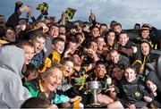 2 November 2014; The Austin Stacks team and supporters celebrate with the cup after the game. Kerry County Senior Football Championship Final Replay, Austin Stacks v Mid Kerry, Fitzgerald Stadium, Killarney, Co. Kerry. Picture credit: Brendan Moran / SPORTSFILE