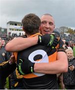 2 November 2014; Kieran Donaghy and William Kirby, 9, Austin Stacks, celebrate after the game. Kerry County Senior Football Championship Final Replay, Austin Stacks v Mid Kerry, Fitzgerald Stadium, Killarney, Co. Kerry. Picture credit: Brendan Moran / SPORTSFILE