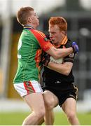 2 November 2014; Shane O'Callaghan, Austin Stacks, is tackled by Pa Kilkenny, Mid Kerry. Kerry County Senior Football Championship Final Replay, Austin Stacks v Mid Kerry, Fitzgerald Stadium, Killarney, Co. Kerry. Picture credit: Brendan Moran / SPORTSFILE