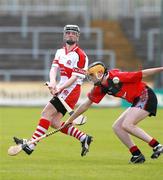 20 May 2007; Fergal McKenna, Derry, in action against Padraig Flynn, Down. ESB Ulster Minor Hurling Championship Semi-Final, Derry v Down, Casement Park, Belfast, Co Antrim. Picture credit: Russell Pritchard / SPORTSFILE