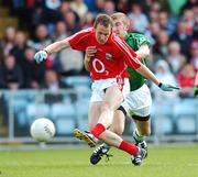 20 May 2007; James Masters, Cork, scores his side's first goal despite the tackle of Shane Gallagher, Limerick. Bank of Ireland Munster Senior Football Championship Quarter-Final, Cork v Limerick, Pairc Ui Chaoimh, Cork. Picture credit: Brendan Moran / SPORTSFILE