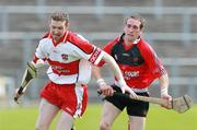 20 May 2007; Sean McBride, Derry, in action against Andy Savage, Down. Guinness Ulster Senior Hurling Championship Semi-Final, Down v Derry, Casement Park, Belfast, Co Antrim. Picture credit: Russell Pritchard / SPORTSFILE