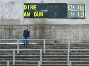 20 May 2007; A fan watches the teams leave the pitch below the final scoreboard. Guinness Ulster Senior Hurling Championship Semi-Final, Down v Derry, Casement Park, Belfast, Co Antrim. Picture credit: Russell Pritchard / SPORTSFILE