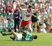 20 May 2007; Mark Little, Fermanagh, after being pushed over by Ryan McMenamin, Tyrone. Bank of Ireland Ulster Senior Football Championship Quarter-Final, Fermanagh v Tyrone, St Tighearnach's Park, Clones, Co Monaghan. Picture credit: Oliver McVeigh / SPORTSFILE