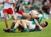 20 May 2007; Martin McGrath, Fermanagh, being held down by Sean Cavanagh, Tyrone, near the end of the game. Bank of Ireland Ulster Senior Football Championship Quarter-Final, Fermanagh v Tyrone, St Tighearnach's Park, Clones, Co Monaghan. Picture credit: Oliver McVeigh / SPORTSFILE