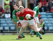 20 May 2007; Andrew O'Sullivan, Cork, in action against Stephen Fox, Limerick. Munster Junior Football Championship Quarter-Final, Cork v Limerick, Pairc Ui Chaoimh, Cork. Picture credit: Brendan Moran / SPORTSFILE