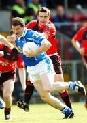 20 May 2007; Larry Reilly, Cavan, in action against Ronan Murtagh, Down. Bank of Ireland Ulster Senior Football Championship, Preliminary Round Replay, Down v Cavan, Esler Park, Newry, Co. Down. Photo by Sportsfile