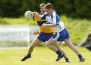 20 May 2007; Liam O'Lonain, Waterford, in action against Laurance Healy, Clare. Bank of Ireland Munster Senior Football Championship Quarter-Final, Waterford v Clare, Fraher Field, Dungarvan, Co. Waterford. Picture credit: Matt Browne / SPORTSFILE