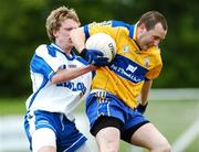 20 May 2007; Mark Kelly, Clare, in action against Cillian O'Keeffe, Waterford. Munster Junior Football Championship Quarter-Final, Waterford v Clare, Fraher Field, Dungarvan, Co. Waterford. Picture credit: Matt Browne / SPORTSFILE