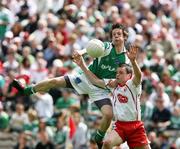 20 May 2007; Tomas Corrigan, Fermanagh, in action against Ronan McNabb, Tyrone. ESB Ulster Minor Football Championship Quarter-Final, Fermanagh v Tyrone, St Tighearnach's Park, Clones, Co Monaghan. Picture credit: Oliver McVeigh / SPORTSFILE