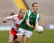20 May 2007; Tom Brewster, Fermanagh, in action against Kevin Hughes, Tyrone. Bank of Ireland Ulster Senior Football Championship Quarter-Final, Fermanagh v Tyrone, St Tighearnach's Park, Clones, Co Monaghan. Picture credit: Oliver McVeigh / SPORTSFILE