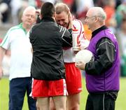 20 May 2007; Gerald Cavlan, Tyrone, is congratulated by Ryan McMenamin at the end of the game. Bank of Ireland Ulster Senior Football Championship Quarter-Final, Fermanagh v Tyrone, St Tighearnach's Park, Clones, Co Monaghan. Picture credit: Oliver McVeigh / SPORTSFILE