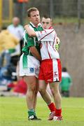 20th May 2007; Shane McDermott, Fermanagh, is commiserated by Niall Gorlmey, Tyrone. Bank of Ireland Ulster Senior Football Championship Quarter-Final, Fermanagh v Tyrone, St Tighearnach's Park, Clones, Co Monaghan. Picture credit: Oliver McVeigh / SPORTSFILE