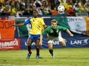 23 May 2007; The Republic of Ireland's Kevin Doyle beats Jairo Campos, Ecuador, to score his side's goal. US Cup, Republic of Ireland v Ecuador, Giants Stadium, Meadowlands Sports Complex, New Jersey, USA. Picture credit: David Maher / SPORTSFILE