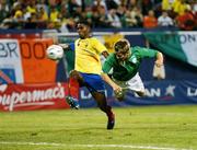 23 May 2007; The Republic of Ireland's Kevin Doyle beats Jairo Campos, Ecuador, to score his side's goal. US Cup, Republic of Ireland v Ecuador, Giants Stadium, Meadowlands Sports Complex, New Jersey, USA. Picture credit: David Maher / SPORTSFILE