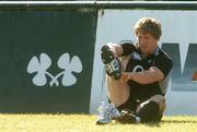 25 May 2007; Jerry Flannery puts on his boots before the Captain's Run. Santa Fe Rugby Club, Santa Fe, Argentina. Picture credit: Pat Murphy / SPORTSFILE