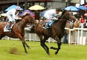 26 May 2007; Cockney Rebel, with Olivier Peslier up, finish ahead of eventual second placed Creachadoir, with Mick Kinane up, on their way to winning the Boylesports Irish 2,000 Guineas. Curragh Racecourse, Co. Kildare. Picture credit: Brendan Moran / SPORTSFILE