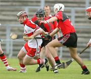 26 May 2007; Sean Leo McGoldrick, Derry, in action against Gabriel Clarke and Stephen Murray, Down. Guinness Ulster Senior Hurling Champoinship Semi-Final, Down v Derry, Casement Park, Belfast, Co. Antrim. Picture credit; Oliver McVeigh / SPORTSFILE