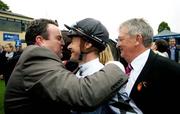 26 May 2007; Winning connections, from left, Owner Phil Cunningham, jockey Olivier Peslier and Trainer Geoffrey Huffer celebrate after Cockney Rebel won the Boylesports Irish 2,000 Guineas. Curragh Racecourse, Co. Kildare. Picture credit: Brendan Moran / SPORTSFILE