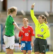26 May 2007; Una Harkin, Northern Ireland, is shown a yellow card by Referee Berta Maria Tavares. Women's European Championship Qualifier, Northern Ireland v Czech Republic, The Showgrounds, Coleraine, Co. Derry. Picture credit; Russell Pritchard / SPORTSFILE