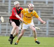 26 May 2007; Darragh Hamill, Antrim, in action against Shane Conlon, Down. ESB Ulster Minor Hurling Champoinship Final, Antrim v Down, Casement Park, Belfast, Co. Antrim. Picture credit; Oliver McVeigh / SPORTSFILE