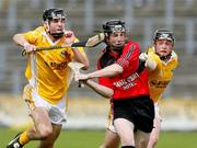 26 May 2007; Malachy Magee, Down, in action against Conor Rocks and Paul Dallat, Antrim. ESB Ulster Minor Hurling Champoinship Final, Antrim v Down, Casement Park, Belfast, Co. Antrim. Picture credit; Oliver McVeigh / SPORTSFILE