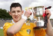 26 May 2007; Antrim's Cormac Donnelly holds aloft the ESB Ulster Minor Hurling cup. ESB Ulster Minor Hurling Champoinship Final, Antrim v Down, Casement Park, Belfast, Co. Antrim. Picture credit; Oliver McVeigh / SPORTSFILE