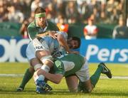 26 May 2007; Juan Martin Fernandez Lobbe, Argentina, is tackled by Ireland's Bryan Young, left, and Malcolm O'Kelly. Summer Tour, 1st Test, Argentina v Ireland, Colon Stadium, Santa Fe, Argentina. Picture credit: Pat Murphy / SPORTSFILE