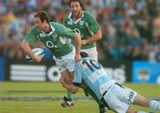 26 May 2007; Geordan Murphy, Ireland, is tackled by Felipe Contepomi, Argentina. Summer Tour, 1st Test, Argentina v Ireland, Colon Stadium, Santa Fe, Argentina. Picture credit: Pat Murphy / SPORTSFILE