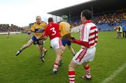 27 May 2007; Clare's Colin Lynch, left, and Diarmuid McMahon, no. 11, clash with Cork's Diarmuid O'Sullivan, no. 3, and Donal Og Cusack, no. 1, after the 2 teams came out of the dressing rooms at the same time. Guinness Munster Senior Hurling Championship Quarter-Final, Cork v Clare, Semple Stadium, Thurles, Co. Tipperary. Picture credit: Brendan Moran / SPORTSFILE